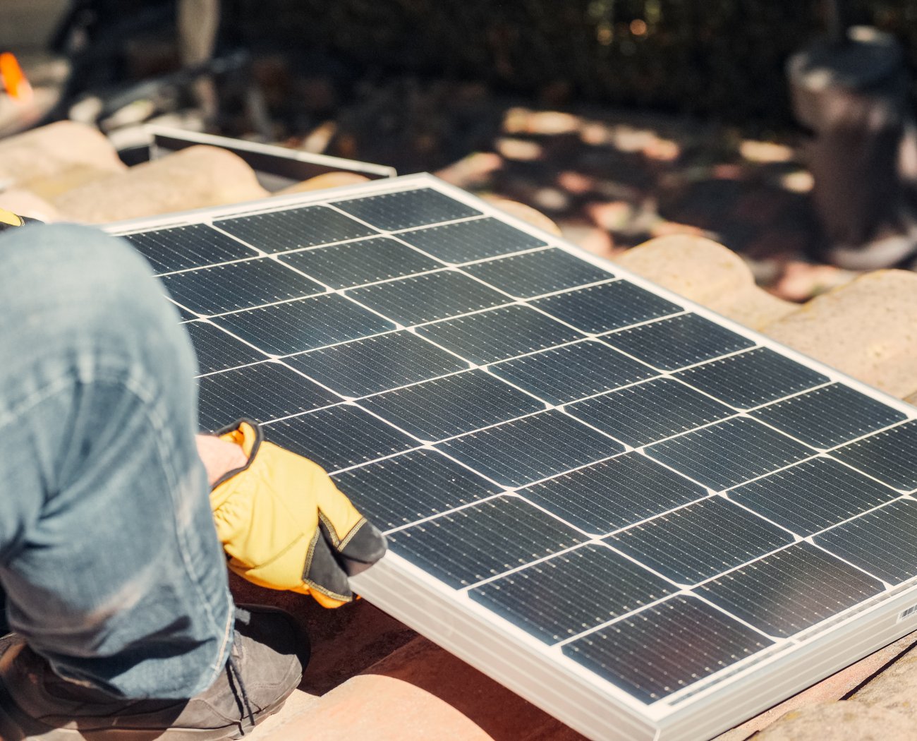Image of Man Installing Solar Panels